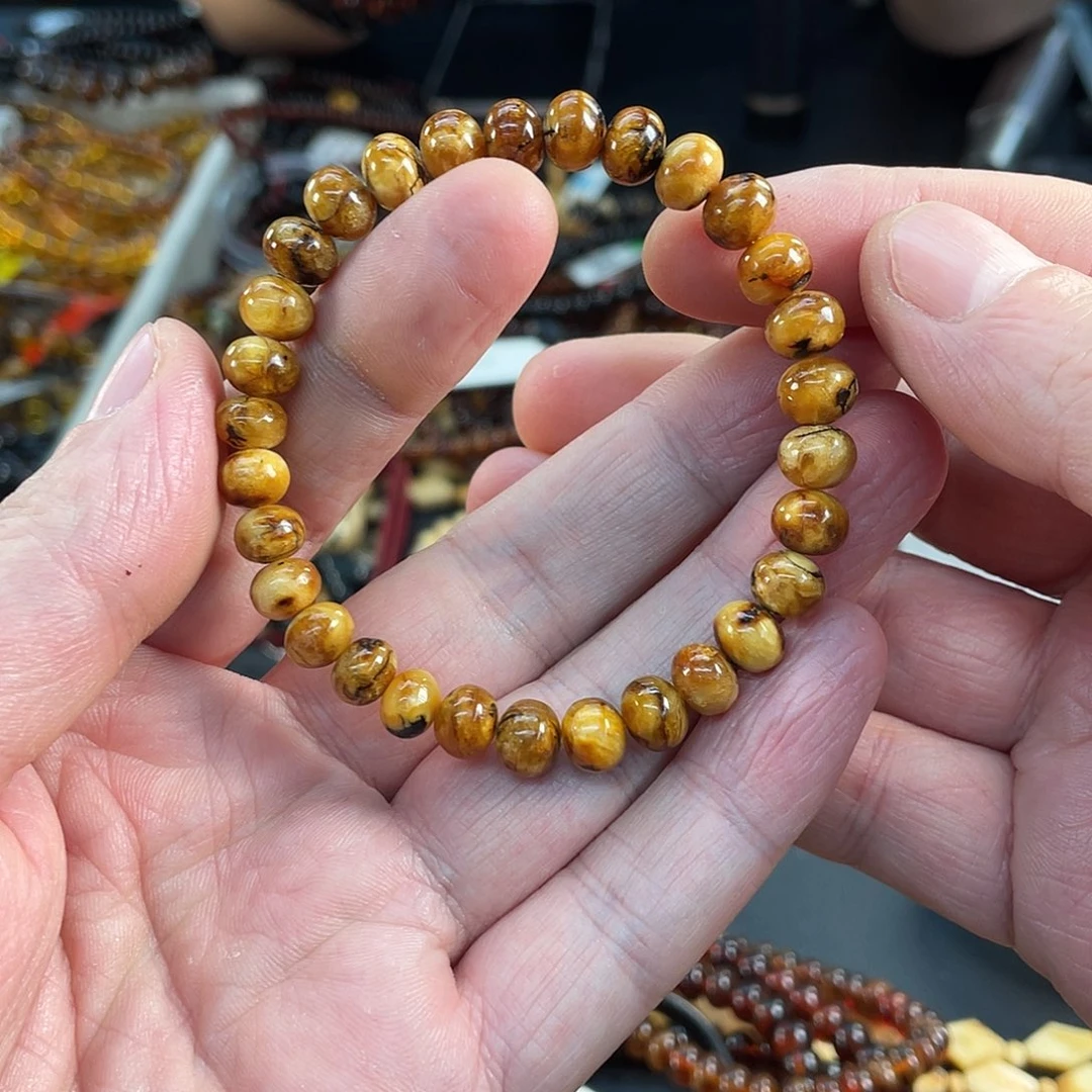 乐***心琥珀未镶嵌裸石7蜜蜡手串