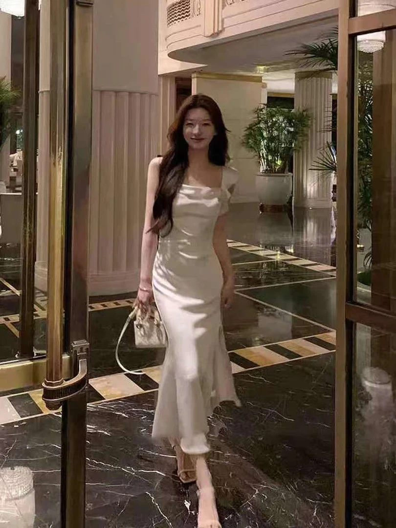 夏季新款法式吊带连衣裙女纯欲气质辣妹修身收腰显瘦百搭包臀长裙