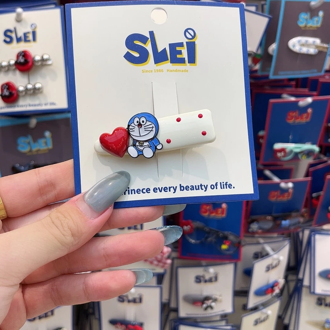 布艺非金属白色波点多啦发夹