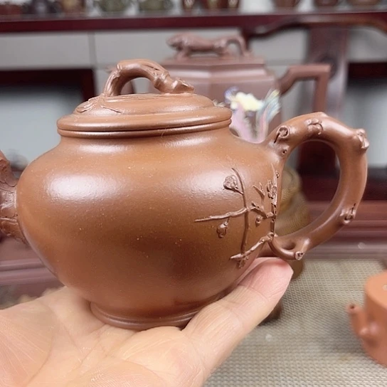 紫砂茶壶是的……是个