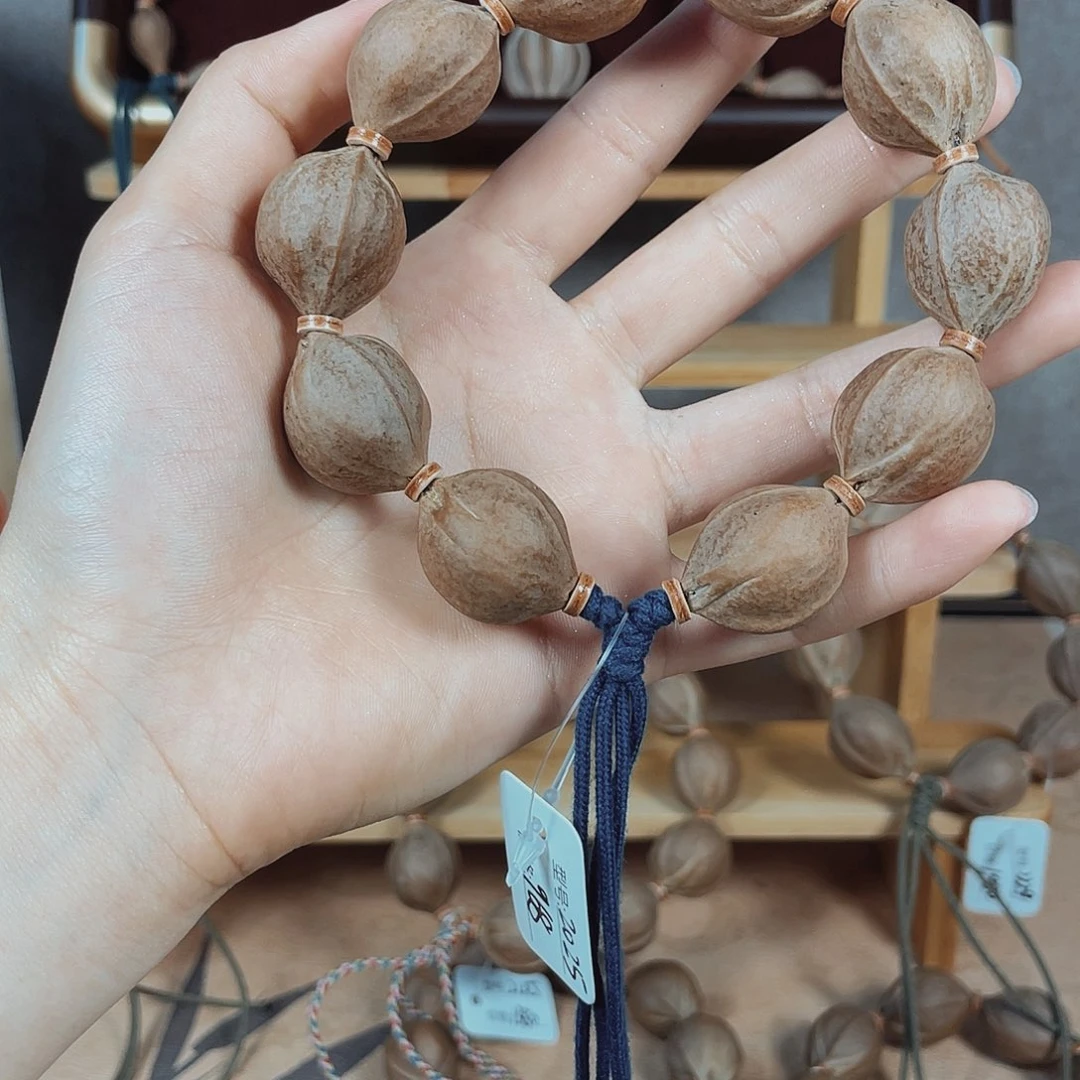 于***是橄榄核手串梅林铁核20.25