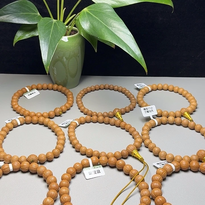 $***$猴头核桃吊坠凤羽