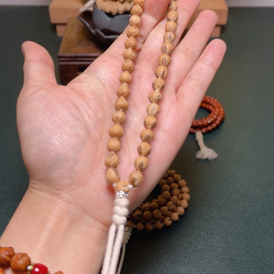 吊坠柏香籽/百香籽莲花手持