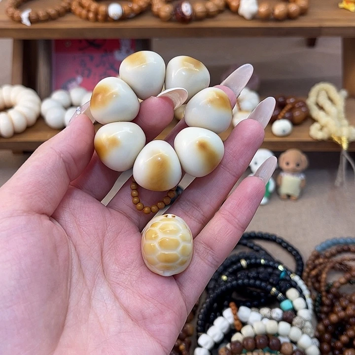 胡***谓吊坠菩提根/象牙果手捻富甲