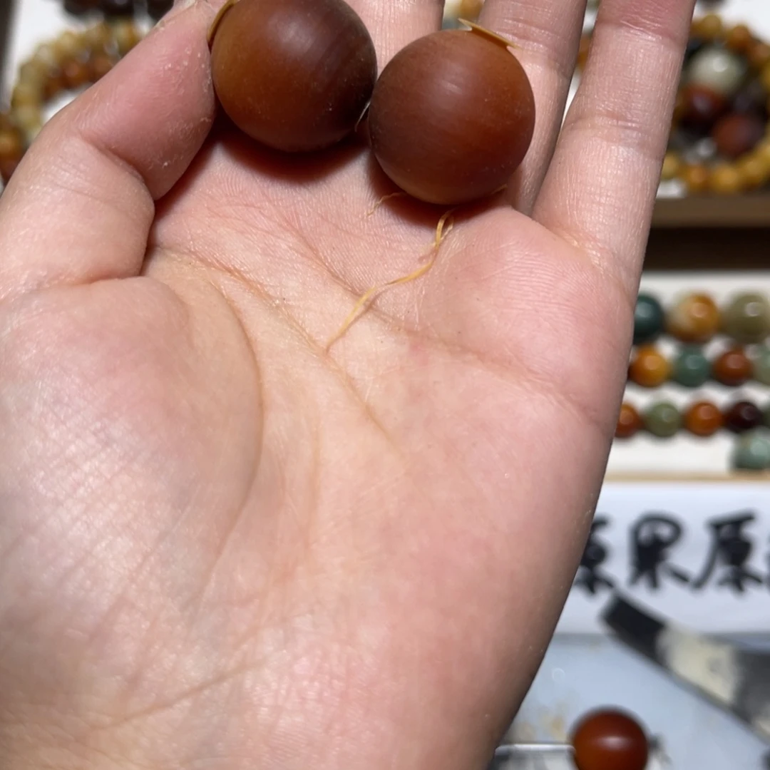 塔***远吊坠菩提根/象牙果卡20棕红圆珠手持