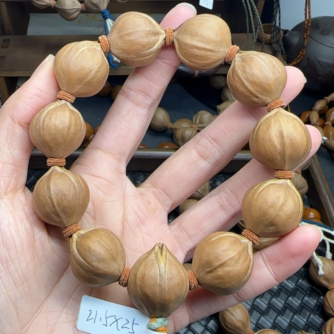 手串橄榄核06。2.15*2.5短圆