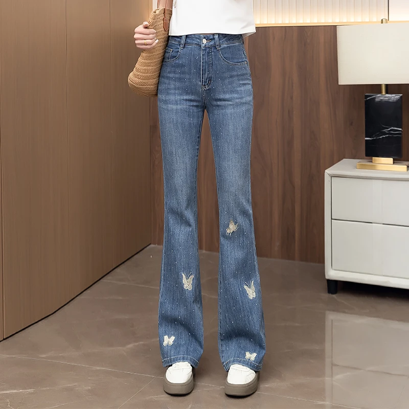 时尚微喇牛仔裤女2025春秋新款高腰修身显瘦蝴蝶刺绣烫钻小喇叭裤