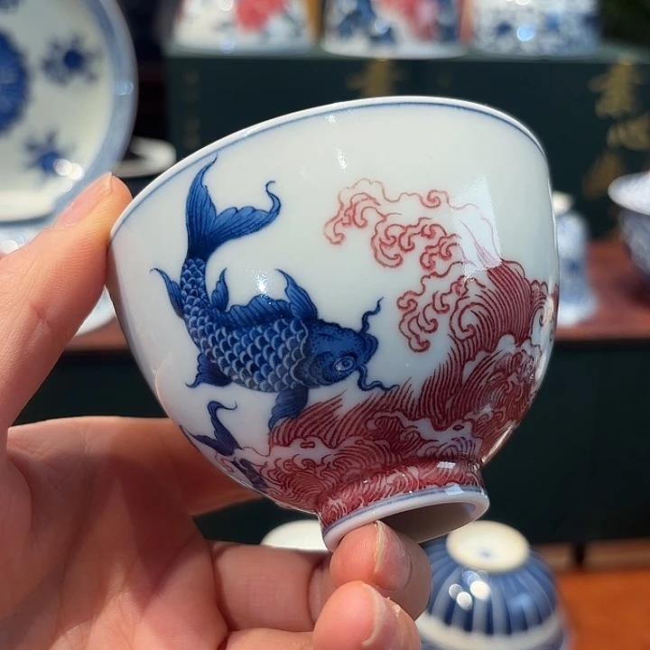 子君堂釉里红海水鱼鸡心杯