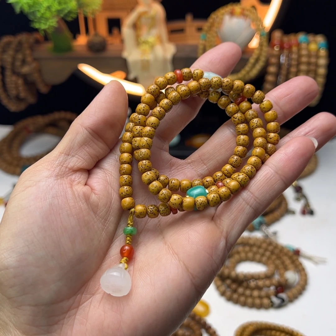 星月菩提吊坠河豚大留白6×5mm老型桶珠三圈手链