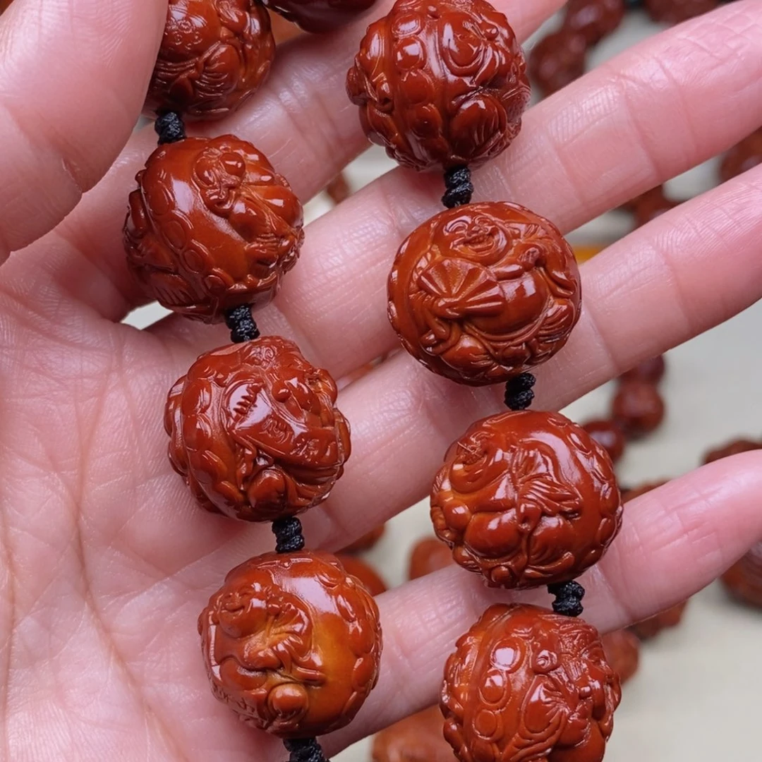 橄榄核吊坠陈*生财迷，