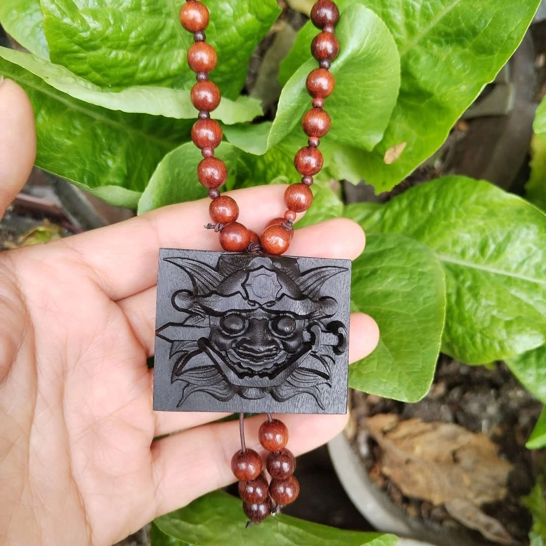 正宗工艺品雕刻地戏面具千年乌木吞口40*49mm