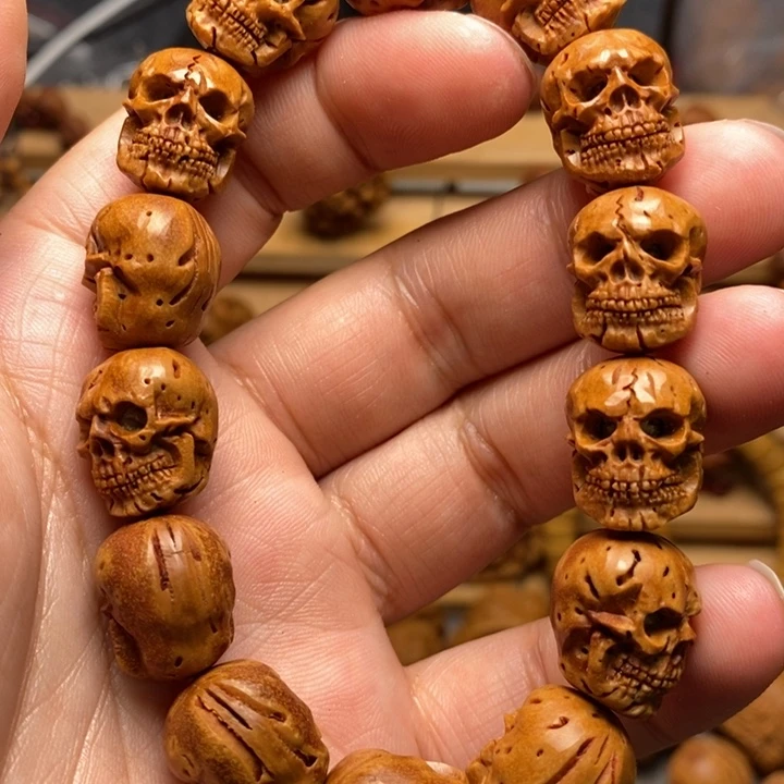 桃核手工雕刻骷髅手串