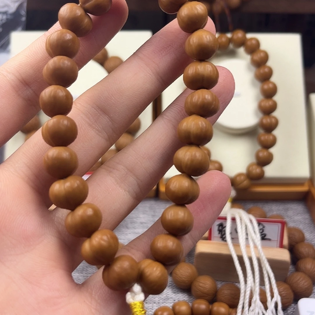 猴头核桃手串屁桃11+手持一串磨砂