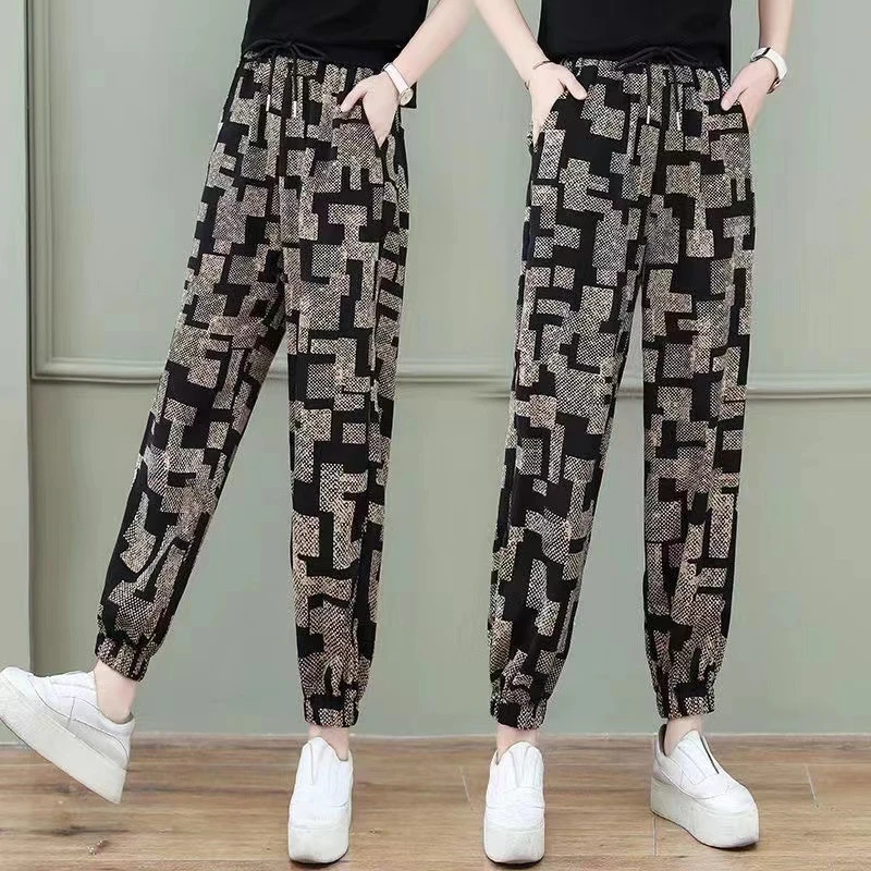 有口袋冰丝束脚裤女2025爆款格纹垂感休闲九分束脚裤印花凉凉裤