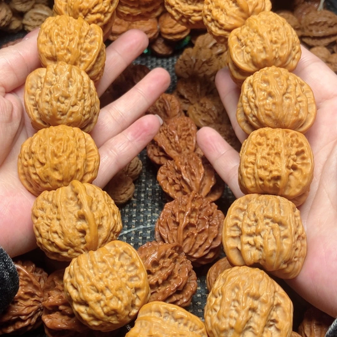 吊坠桃核白狮子麻核桃手持