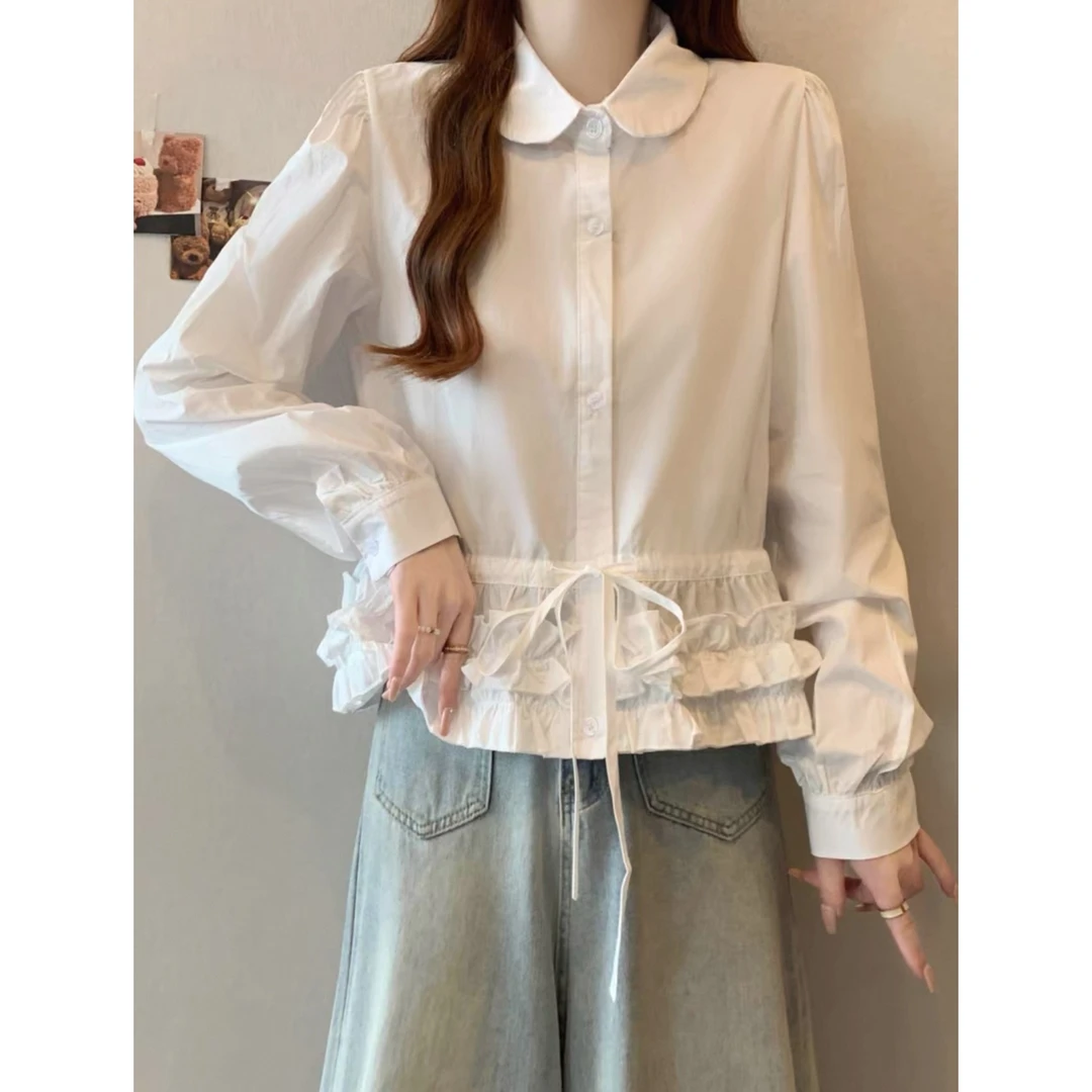 蓬松花瓣下摆衬衫2025新款春季压褶白色花边娃娃领长袖衬衣