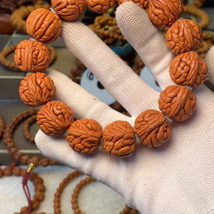 …***.桃核手串秦岭龙纹