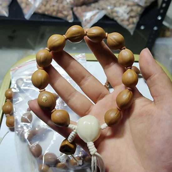 骑***叔吊坠橄榄核梅林水晶核