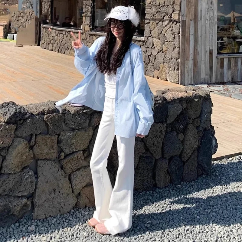 雪千羽白色修身显瘦高腰微喇牛仔裤女2025春夏新款bf风马蹄喇叭裤