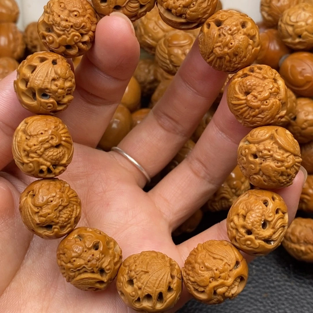 橄榄核手串镂空龙