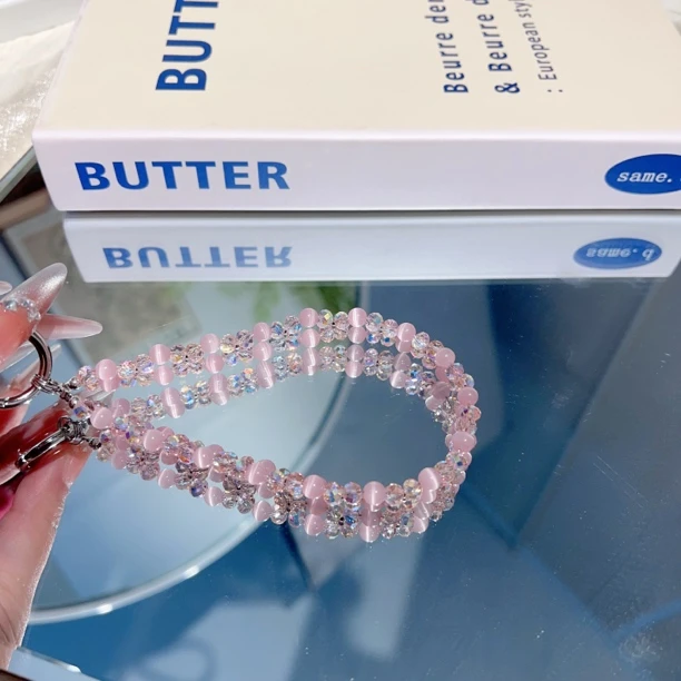 粉猫眼编织手机链