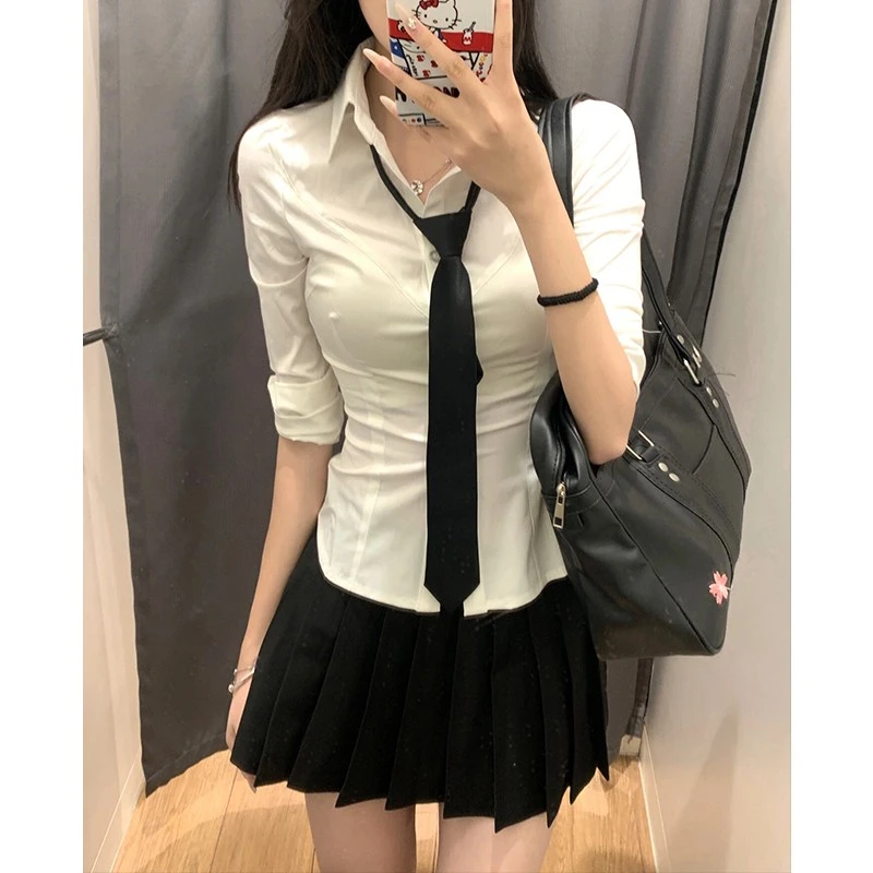 辣妹纯欲制服修身白色长袖收腰衬衫女夏显瘦狗短百褶裙套装