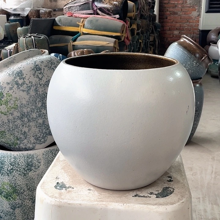 紫砂花盆正品口19高23。z z
