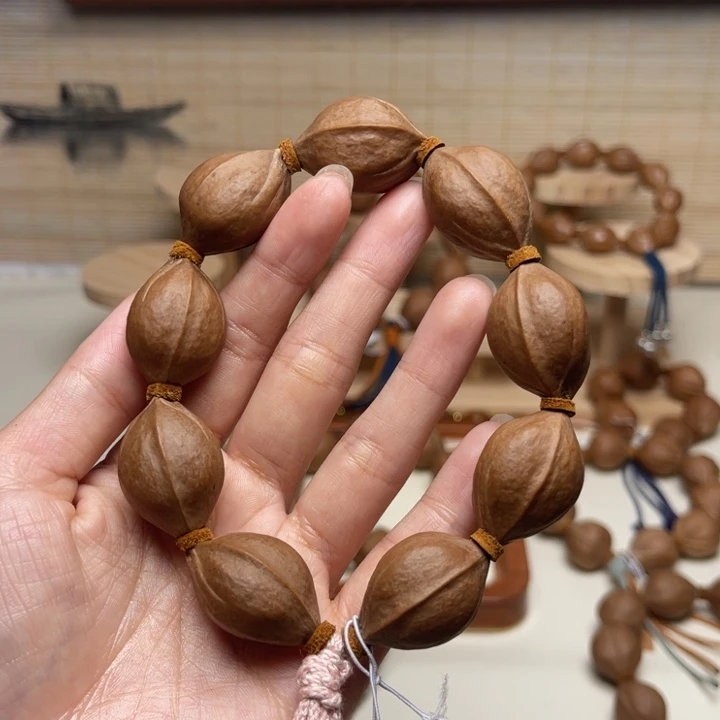 媛***皙手串/手链橄榄核19.28精品梅林铁核