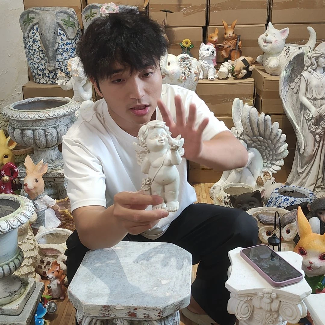 合成树脂拿小鸟天使