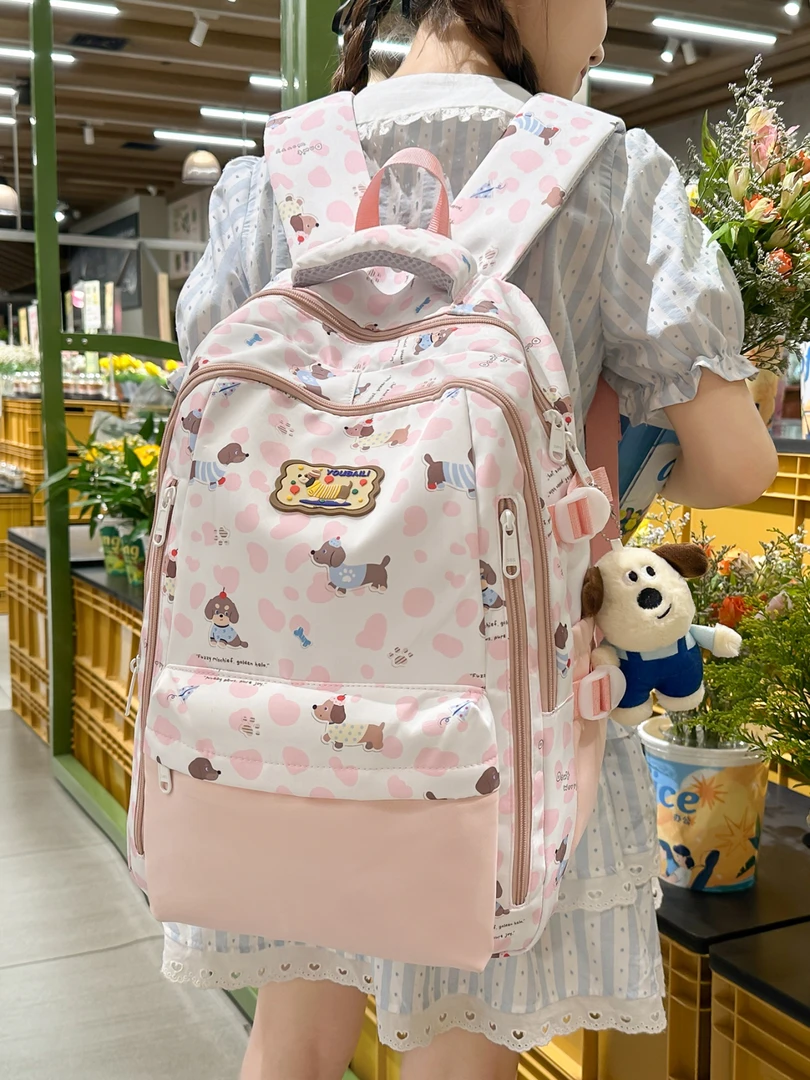 书包轻便大容量中小学生双肩包可挂拉杆高颜值休闲旅行通勤电脑包