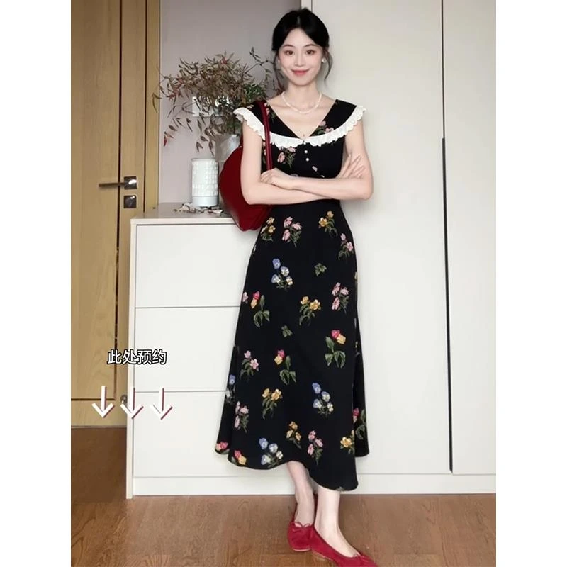 2025夏季新款法式复古翻领无袖碎花连衣裙旅游度假风娃娃领长裙子