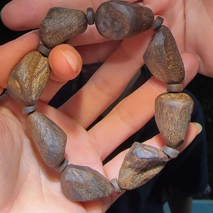 用***9手串沉香原母树沉水树丁手串23.8克