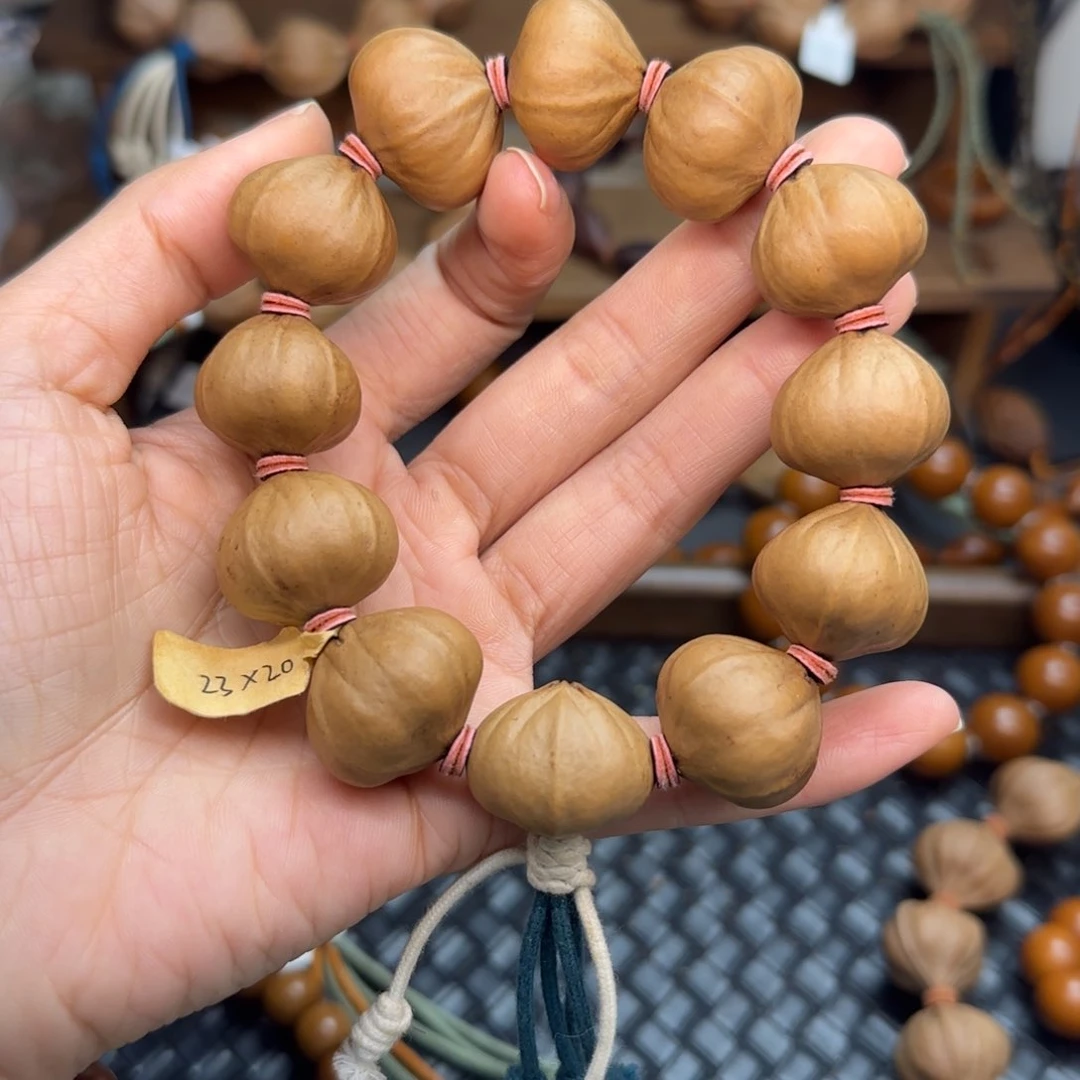 手串橄榄核03。2.3*2.0四花蒜头