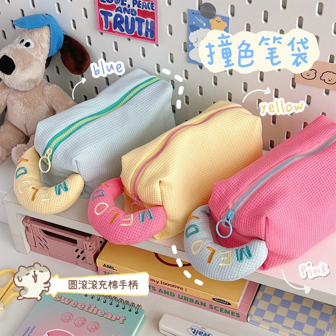 奶油泡芙手提化妆包笔袋少女心奶呼大容量简约撞色学生文具收纳包