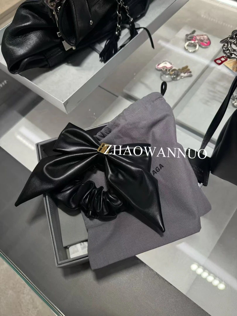 ZHAO WANNUO 丨蝴蝶结金属头层牛皮发圈NC0910