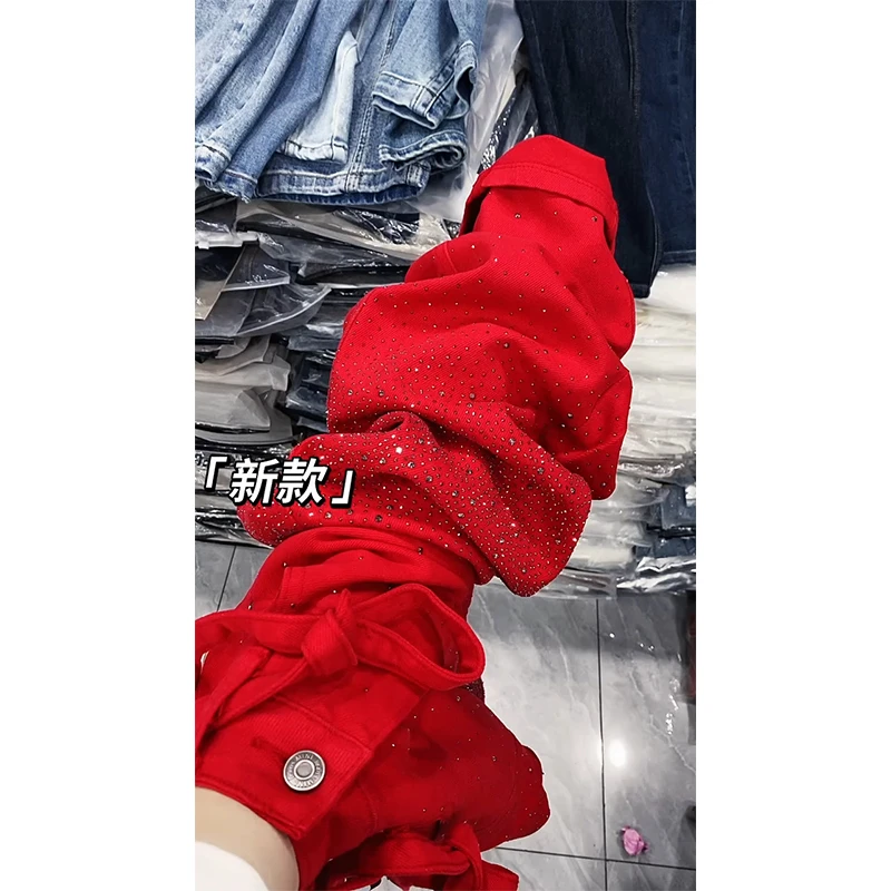 早春穿搭2026新款韩版时尚设计感弯刀烫钻牛仔裤显瘦高腰红色长裤