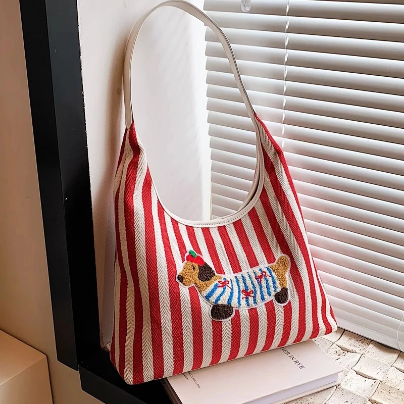 可爱条纹单肩包女2025新款刺绣腊肠狗针织帆布包腋下大容量托特包