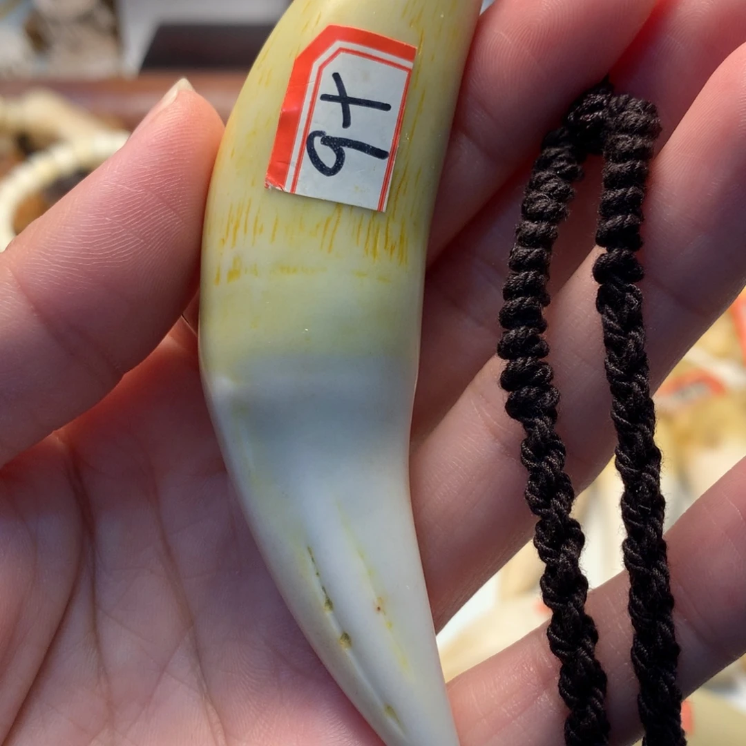 驼骨把件驼骨把件黄色牙牙