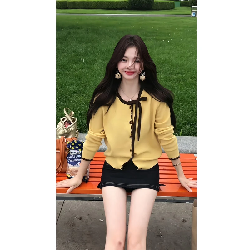 黄色蝴蝶结长袖针织开衫女早秋法式上衣包臀裙半身裙一步裙短裙女