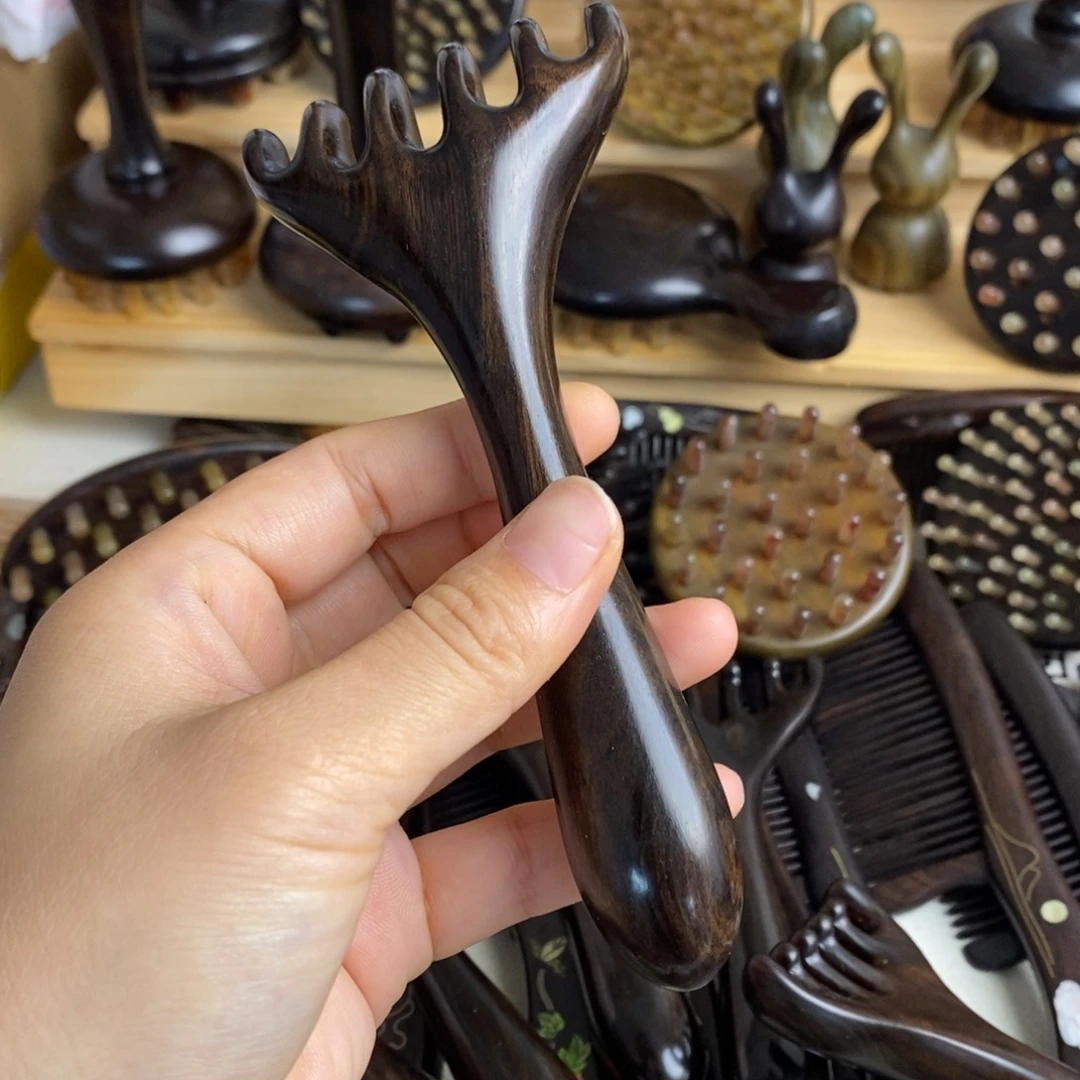 瑕疵紫光檀耙子按摩