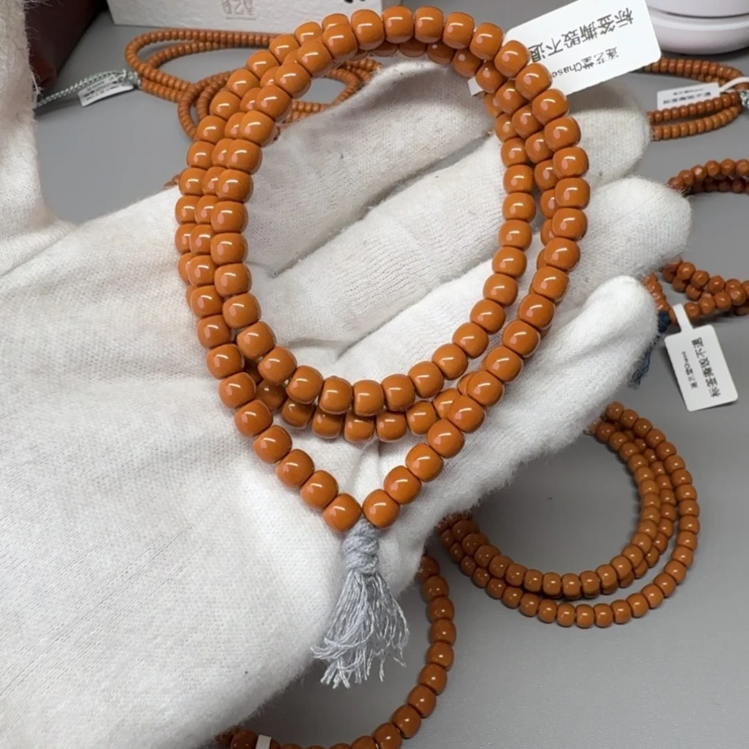 T***t手串橄榄核小微白62尺108老挝红核核尖