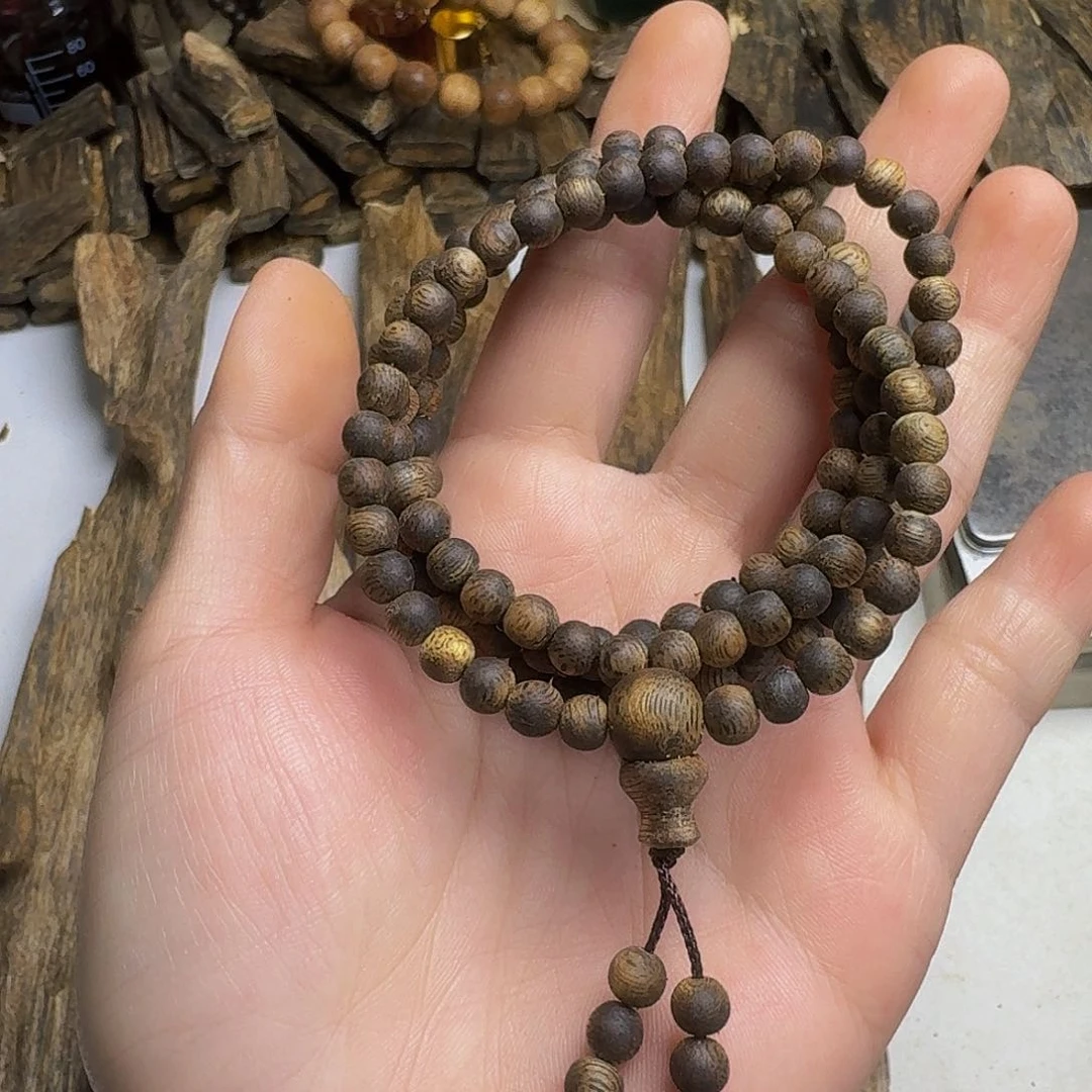 沉香碎屑沉香K**k黑棋99沉0.5，10.8克