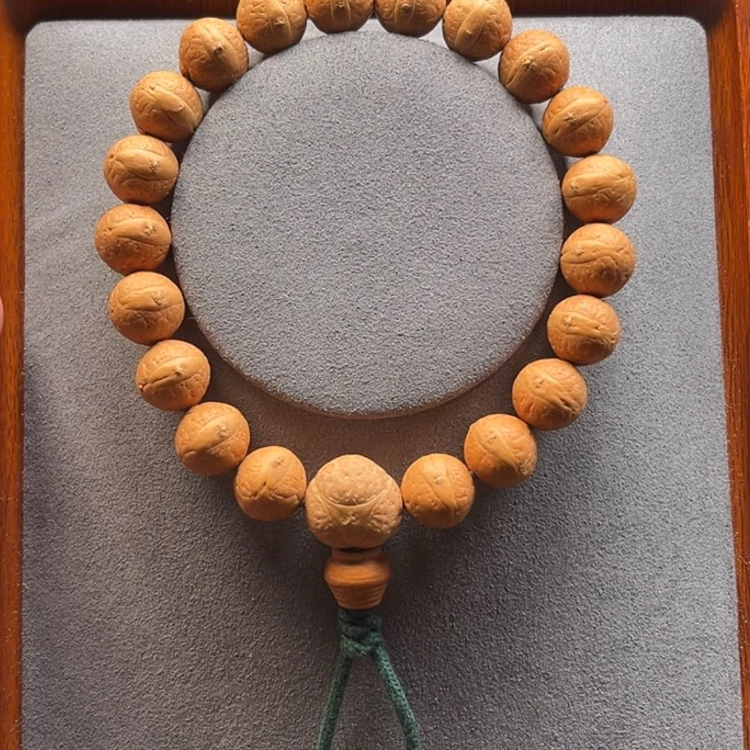 凤眼菩提手串12.9-13.2圆桩玉华皮股眼手串