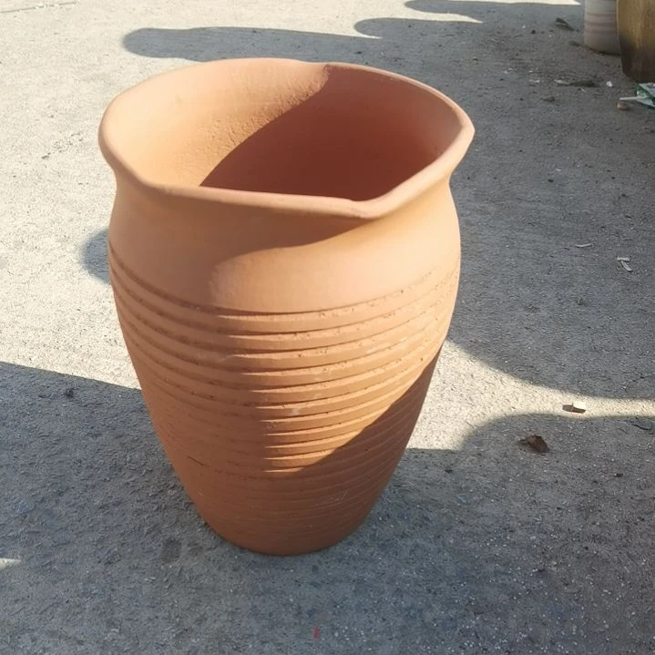 红陶口20高29瑕疵口变形扁了