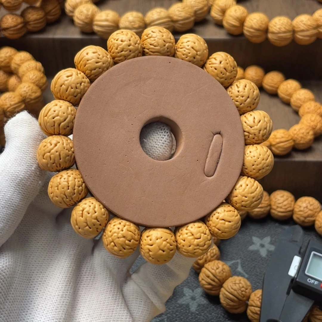 桃核手串@***.金丹精品