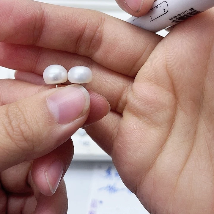 淡水珍珠耳饰银S925镶嵌高**?