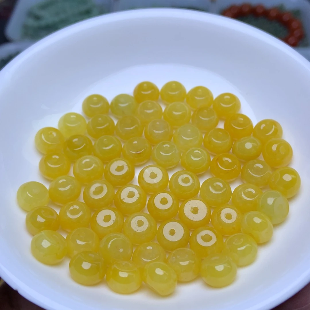 手链翡翠未镶嵌卡6.3乘8.5冰黄鼓珠10个