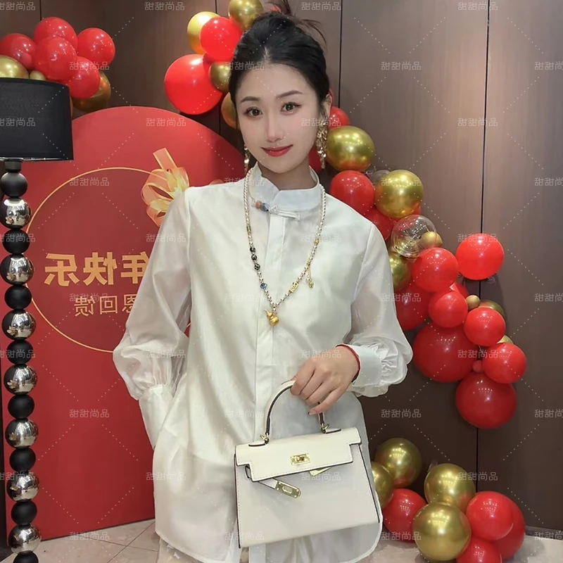 2025春季薄款微透复古立领宽松长袖衬衫女时尚侧开叉简约大气衬衣