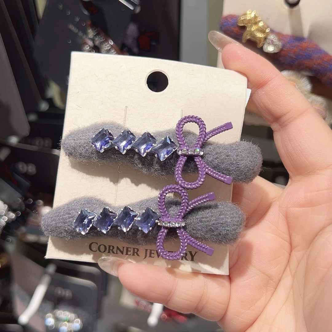 非金属紫色钻钻蝴蝶结鸭夹