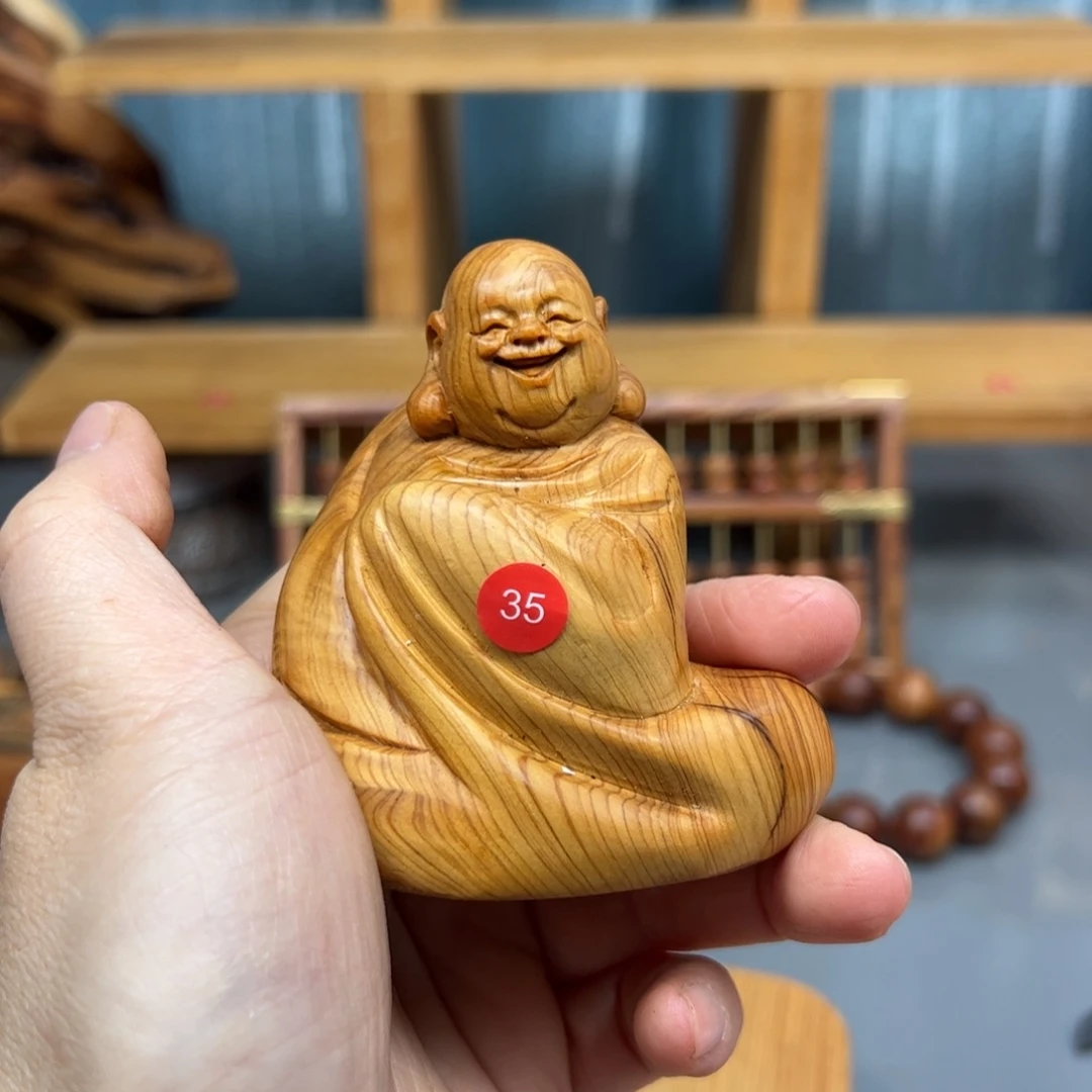 张***曦木崖柏木摆件手把件